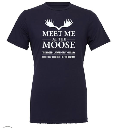 A navy blue short-sleeve t-shirt with a white graphic print on the front featuring a moose antler silhouette and the text 'MEET ME AT THE MOOSE' followed by smaller text 'THE MOOSE • LATHAM • TIDY • ALBANY' and 'GOOD FOOD • COLD BEER • BETTER COMPANY'.